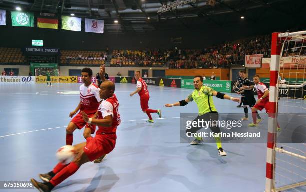 Marcus Vinicius Da Silva Lima and Goalkeeper Raul Mantelli Guimaraes of Jahn Regensburg in action during the Deutsche Futsal Meisterschaft between...