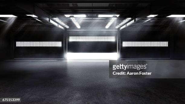 empty pit garage - lights stock illustrations