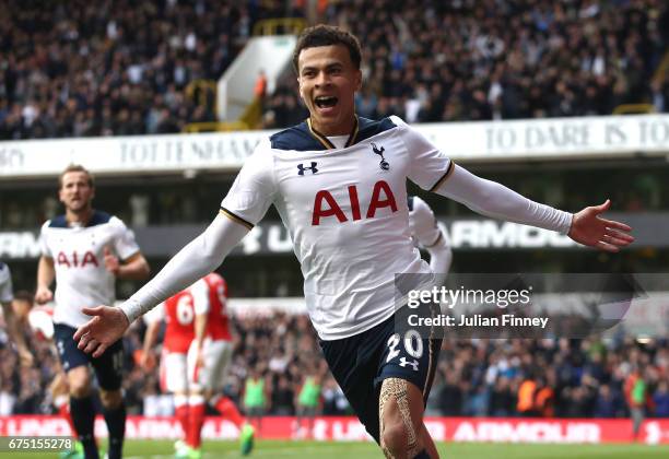 Dele Alli of Tottenham Hotspur celebrates scoring his sides first goal during the Premier League match between Tottenham Hotspur and Arsenal at White...