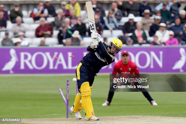 Tom Alsop of Hampshire loses his middle stump as he is bowled by Matt Quinn during the Royal London One-Day Cup between Essex and Hampshire at...