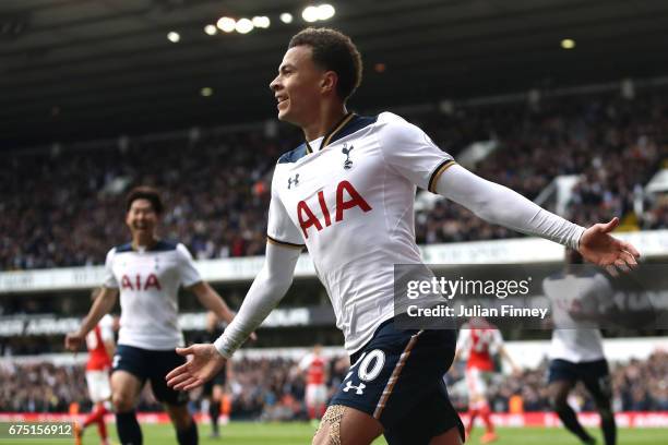 Dele Alli of Tottenham Hotspur celebrates scoring his sides first goal during the Premier League match between Tottenham Hotspur and Arsenal at White...