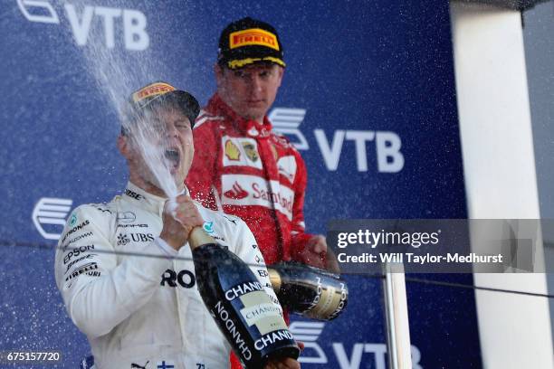 Race winner Valtteri Bottas of Finland and Mercedes GP celebrates on the podium during the Formula One Grand Prix of Russia on April 30, 2017 in...