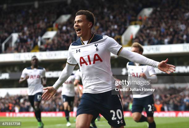 Dele Alli of Tottenham Hotspur celebrates scoring his sides first goal during the Premier League match between Tottenham Hotspur and Arsenal at White...