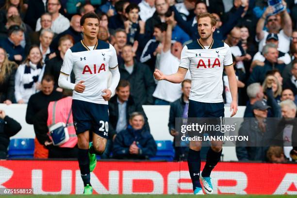 Tottenham Hotspur's English striker Harry Kane celebrates scoring the team's second goal with Tottenham Hotspur's English midfielder Dele Alli during...