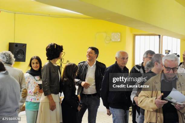 Former Italian Prime Minister and PD secretary Matteo Renzi queueing to cast his vote for Democratic Party leadership primaries on April 30, 2017 in...