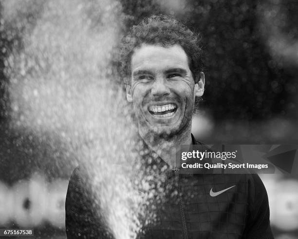 Rafael Nadal of Spain celebrates with the trophy after winning his match and become Champion of the Barcelona Open Banc Sabadell against Dominic...