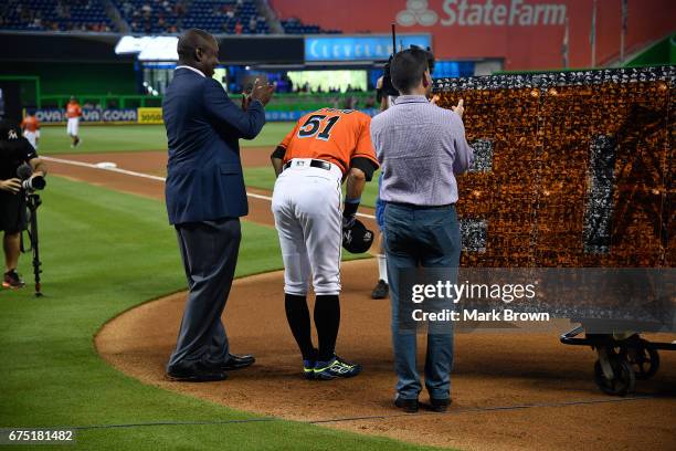 President of the Miami Marlins David P. Samson and President of Baseball Operations Michael Hill honor Ichiro Suzuki of the Miami Marlins for his...