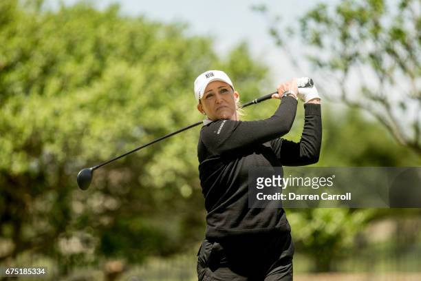 Cristie Kerr of the United States plays her tee shot on the second hole during the final round of the Volunteers of America North Texas Shootout at...