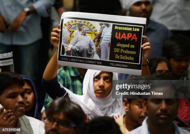 Activists during the protest march for demanding release of Prof. GN Saibaba and five others sentenced to life imprisonment in Nagpur prison and 7...