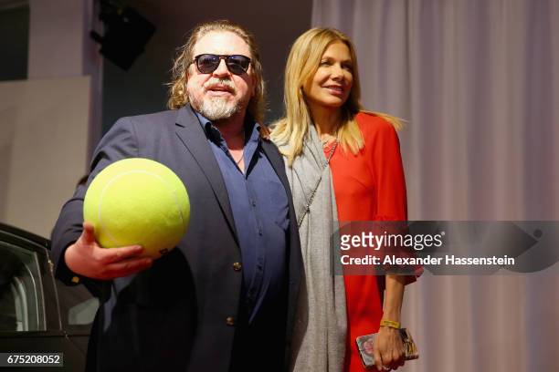 Armin Rohde arrives with Ursula Karven at the Players Night of the 102. BMW Open by FWU at Iphitos tennis club on April 30, 2017 in Munich, Germany.