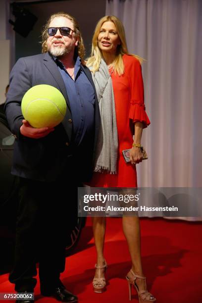 Armin Rohde arrives with Ursula Karven at the Players Night of the 102. BMW Open by FWU at Iphitos tennis club on April 30, 2017 in Munich, Germany.