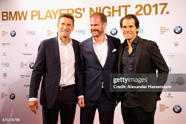 Tournament director Patrick Kuehnen, Peter Bosch and Tommy Haas arrive at the Players Night of the 102. BMW Open by FWU at Iphitos tennis club on...