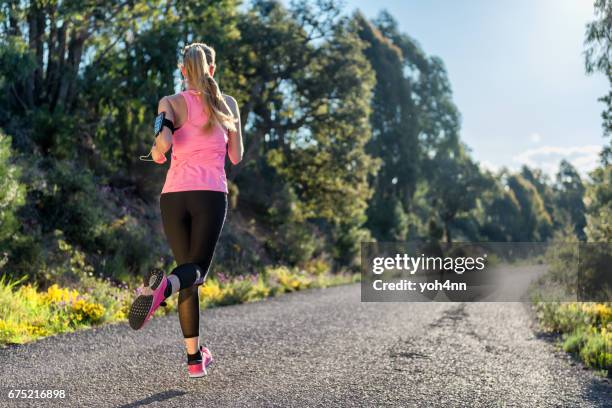 sportswoman & sprinting performance - sprint phone stock pictures, royalty-free photos & images