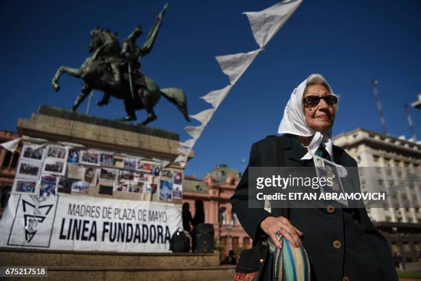 Member of the Argentine human rights group "Madres de Plaza de Mayo", Mirta Acuna de Baravalle, poses in front of the Casa Rosada government palace...