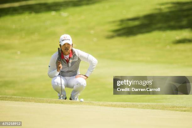 Haru Nomura of Japan lines up a puttat the ninth hole during the final round of the Volunteers of America North Texas Shootout at Las Colinas Country...