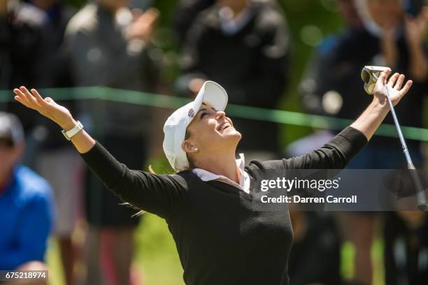 Cristie Kerr of the United States reacts to making a birdie putt at the eighth hole during the final round of the Volunteers of America North Texas...