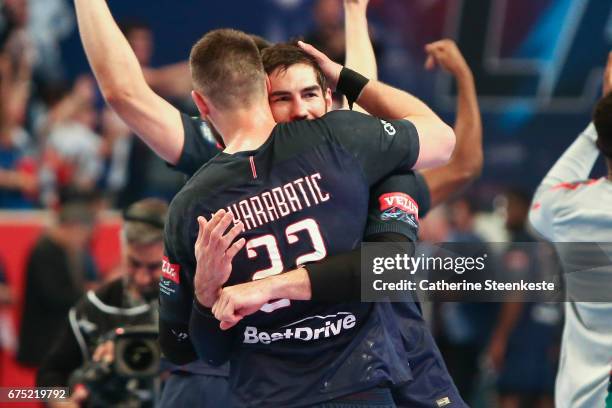 Luka Karabatic and Nikola Karabatic of Paris Saint Germain are celebrating the victory of the Champions League match between PSG and MOL Pick Szeged...