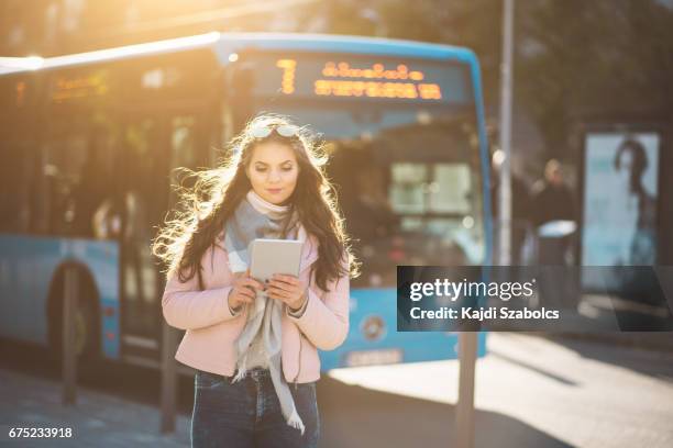 women using tablet in budapest - bus hungary stock pictures, royalty-free photos & images