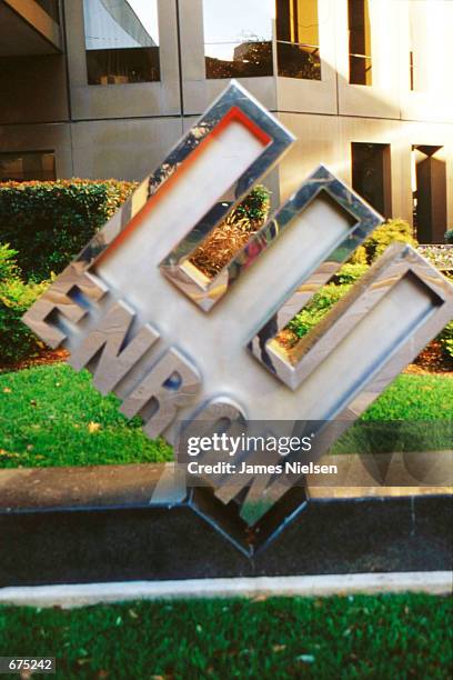 An Enron sign stands in front of the company's headquesters December 3,2001 in Houston, Texas. Enron filed for Chapter 11 protection and sued rival...