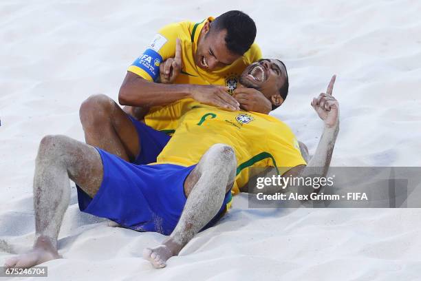 Rodrigo of Brazil celebrates a goal with team mate Bruno Xavier during the FIFA Beach Soccer World Cup Bahamas 2017 group D match between Poland and...