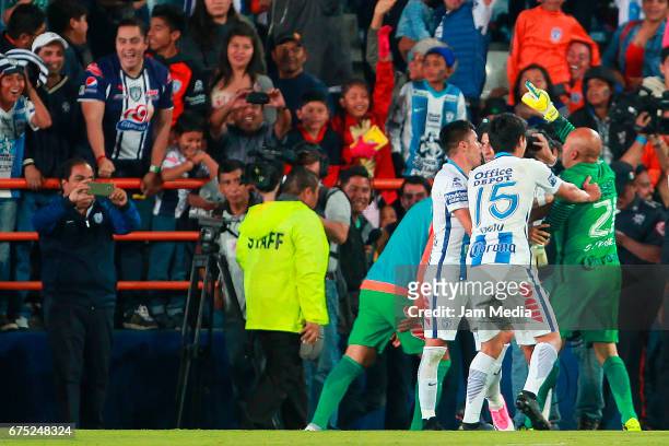 Oscar Perez goalkeeper of Pachuca celebrates with teammates after scoring the second goal of his team during a match between Pachuca and Cruz Azul as...