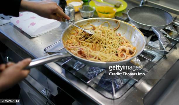 Kamza, Albania Preparation of pasta with seafood. Training of cooks in a vocational school in Kamza, Albania on March 28, 2017 in Kamza, Albania.