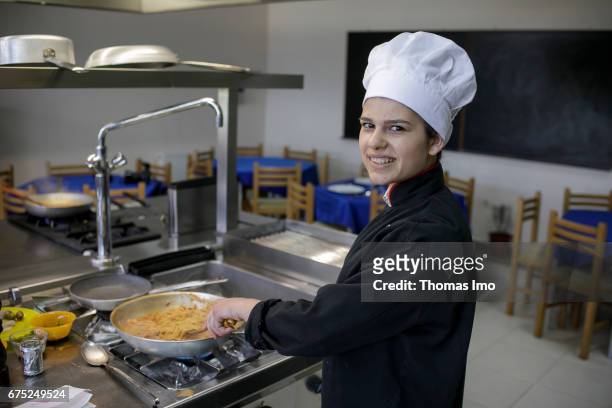 Kamza, Albania Portrait of a trainee as a cook in a vocational school in Kamza, Albania on March 28, 2017 in Kamza, Albania.