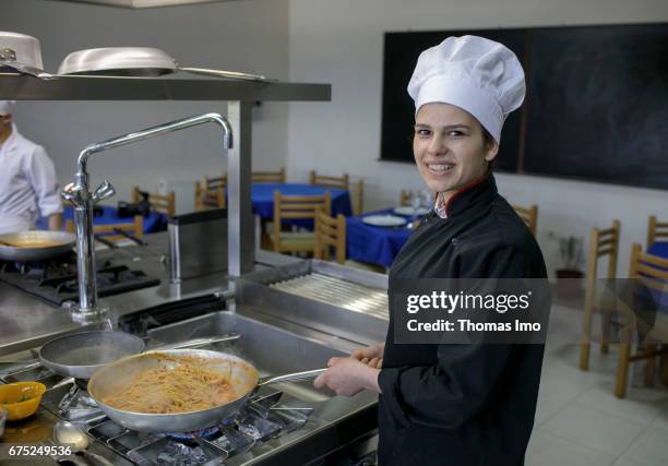 Kamza, Albania Portrait of a trainee as a cook in a vocational school in Kamza, Albania on March 28, 2017 in Kamza, Albania.