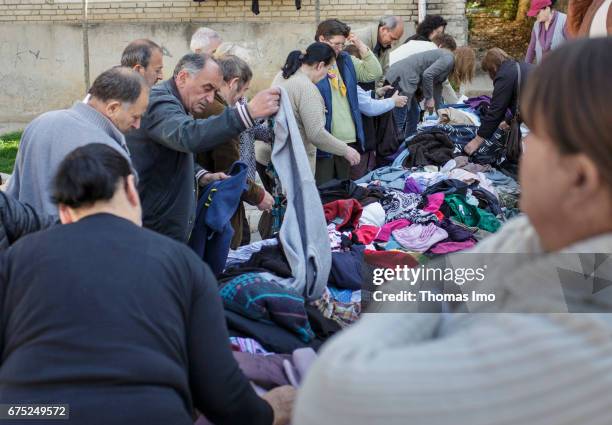 Tirana, Albania Street sale of clothes on a market. Street scene in Tirana, Albania on March 28, 2017 in Tirana, Albania.