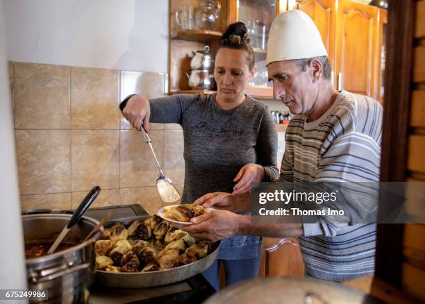 Peja, Kosovo The innkeeper of a guest house cooks for her guests on March 30, 2017 in Peja, Kosovo.