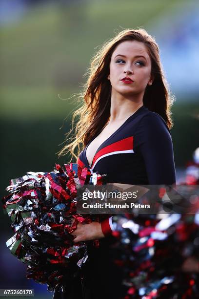 Warriors cheerleader waits for the play to start during the round nine NRL match between the New Zealand Warriors and the Sydney Roosters at Mt Smart...