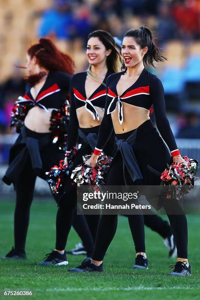 Warriors cheerleaders perform during the round nine NRL match between the New Zealand Warriors and the Sydney Roosters at Mt Smart Stadium on April...