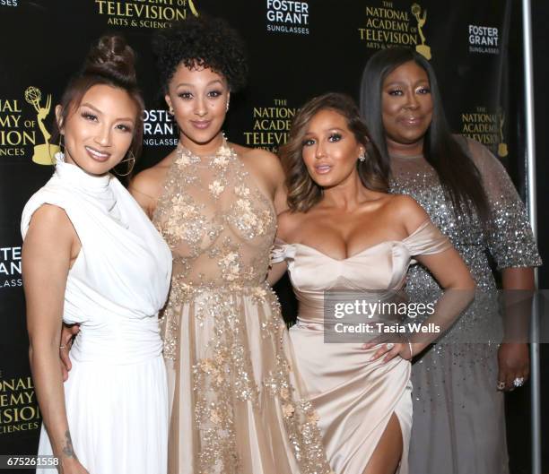 Jeannie Mai, Tamera Mowry, Adrienne Bailon, Loni Love, of the show The Real attend the 44th Daytime Emmy Awards with Foster Grant on April 30, 2017...