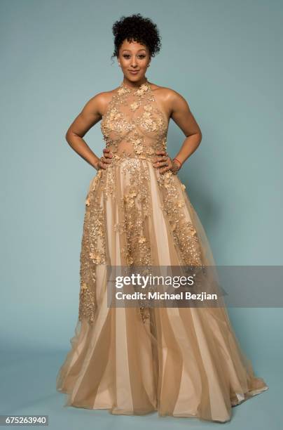 Actor Tamera Mowry poses for a portrait at "Portraits by The Artists Project Sponsored by Foster Grant on" during the 44th Daytime Emmy Awards on...