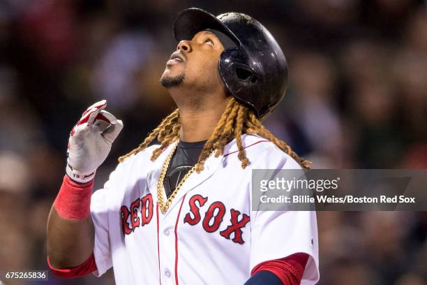 Hanley Ramirez of the Boston Red Sox reacts after hitting a two run home run during the first inning of a game against the Chicago Cubs on April 30,...