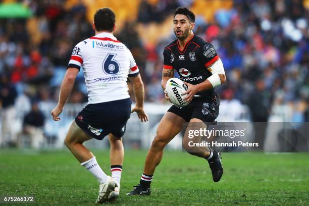 Shaun Johnson of the Warriors makes a break during the round nine NRL match between the New Zealand Warriors and the Sydney Roosters at Mt Smart...