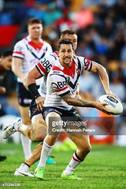 Mitchell Pearce of the Roosters looks to pass the ball out during the round nine NRL match between the New Zealand Warriors and the Sydney Roosters...