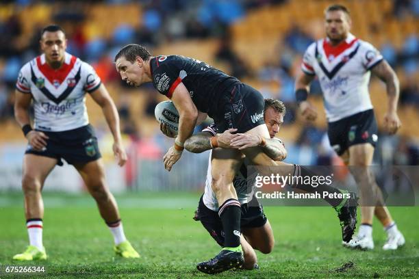 Ryan Hoffman of the Warriors charges forward during the round nine NRL match between the New Zealand Warriors and the Sydney Roosters at Mt Smart...