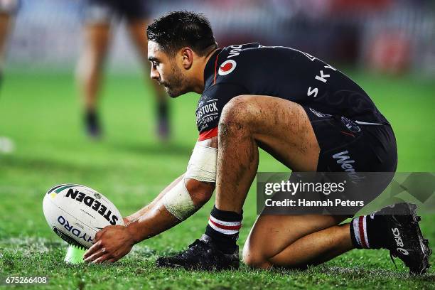 Shaun Johnson of the Warriors lines up a penalty kick during the round nine NRL match between the New Zealand Warriors and the Sydney Roosters at Mt...