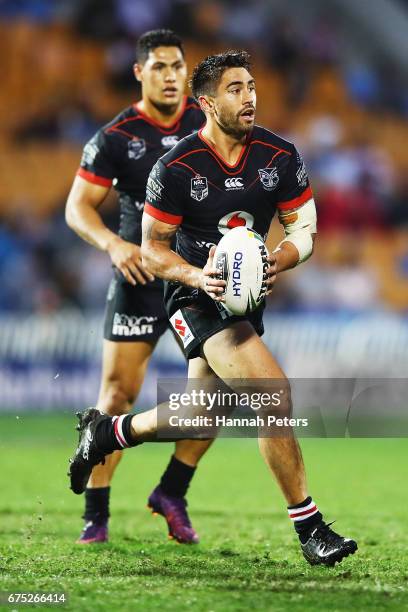 Shaun Johnson of the Warriors makes a break during the round nine NRL match between the New Zealand Warriors and the Sydney Roosters at Mt Smart...