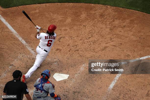 Anthony Rendon of the Washington Nationals follows through on an RBI double that scored three runs during the fifth inning against the New York Mets...