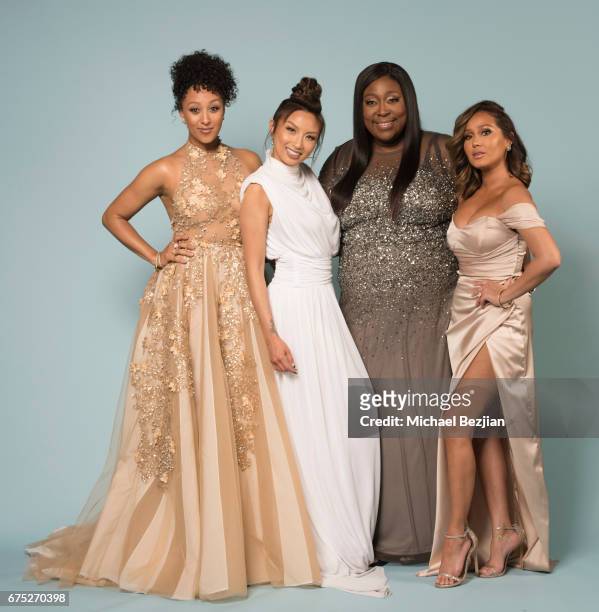 Tamera Mowry, Jeannie Mai, Loni Love, and Adrienne Bailon pose for a portrait at "Portraits by The Artists Project Sponsored by Foster Grant on"...