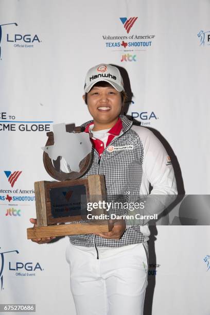 Haru Nomura of Japan poses with the champion's trophy following her playoff victory over Cristie Kerr in the final round of the Volunteers of America...