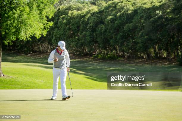 Haru Nomura of Japan reacts to a putt for double-bogey at the seventeenth hole during the final round of the Volunteers of America North Texas...