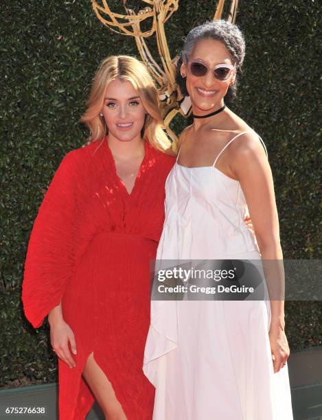 Daphne Oz and Carla Hall arrive at the 44th Annual Daytime Emmy Awards at Pasadena Civic Auditorium on April 30, 2017 in Pasadena, California.