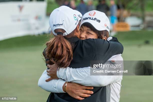 Haru Nomura of Japan is embraced by Minjee Lee of Australia following her victory at the Volunteers of America North Texas Shootout at Las Colinas...