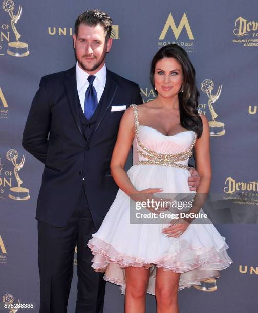 Actress Nadia Bjorlin and husband Grant Turnbull arrive at the 44th Annual Daytime Emmy Awards at Pasadena Civic Auditorium on April 30, 2017 in...