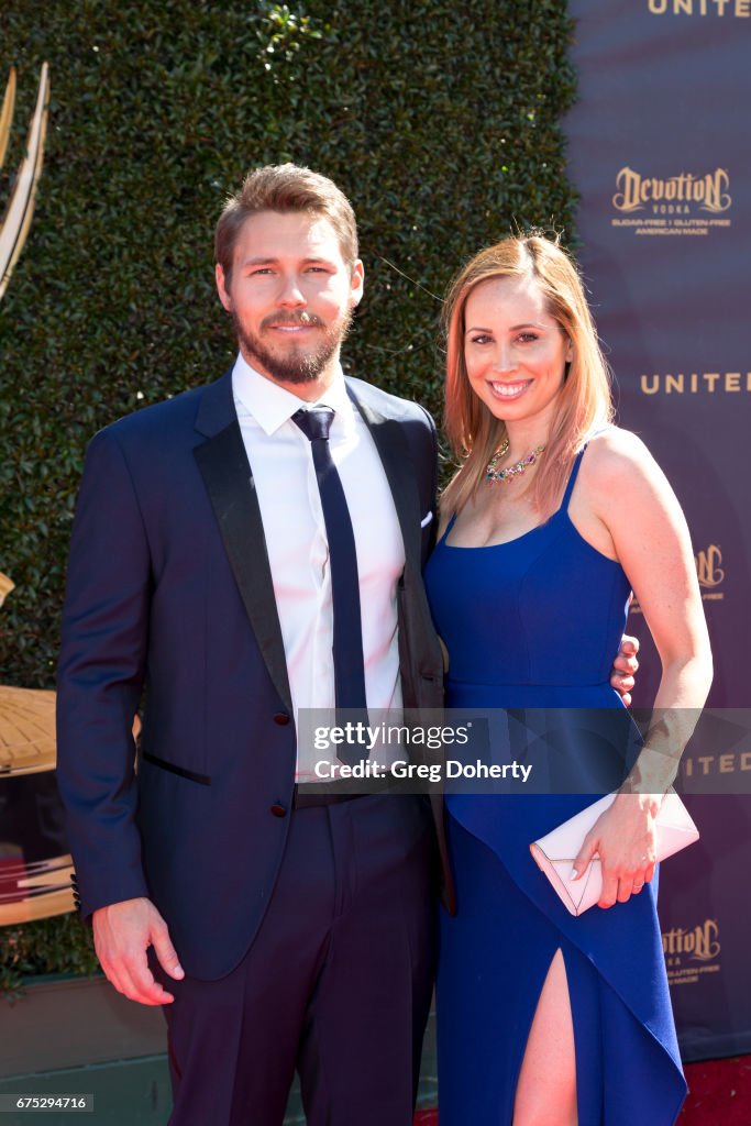 Actor Scott Clifton and wife Nicole Lampson arrives at the 44th... News