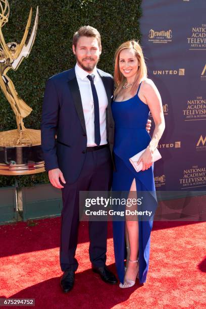 Actor Scott Clifton and wife Nicole Lampson arrives at the 44th Annual Daytime Emmy Awards at Pasadena Civic Auditorium on April 30, 2017 in...