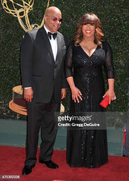 Kym Whitley and brother arrive at the 44th Annual Daytime Emmy Awards at Pasadena Civic Auditorium on April 30, 2017 in Pasadena, California.